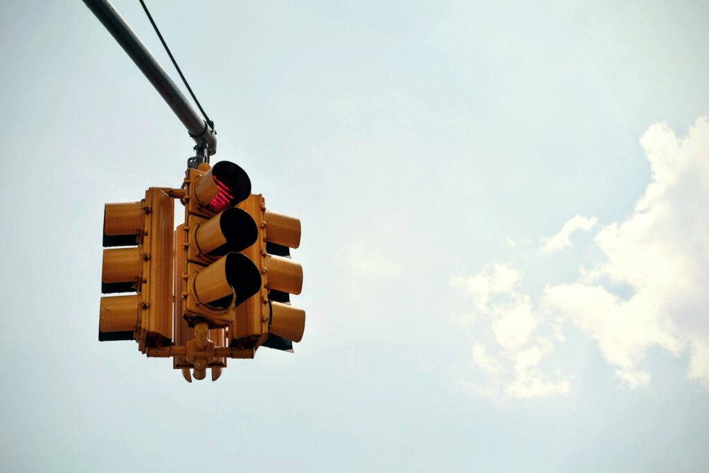 traffic light under blue sky