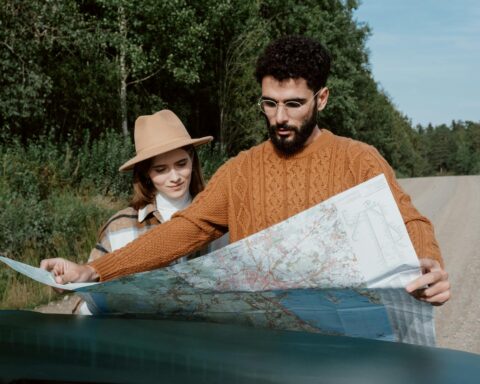 a couple looking at a map