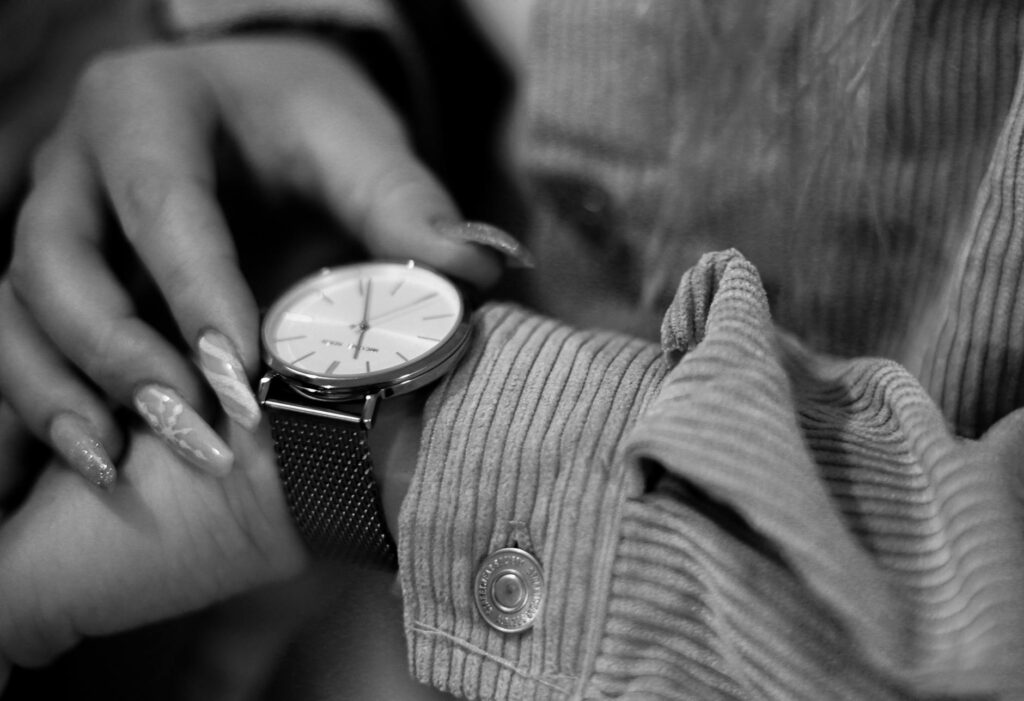 analog wristwatch in black and white