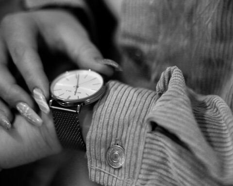 analog wristwatch in black and white