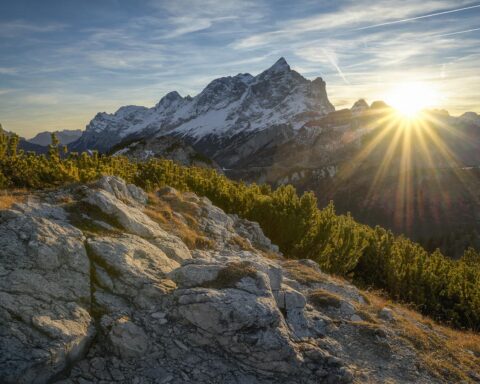 snow covered mountain during sunrise