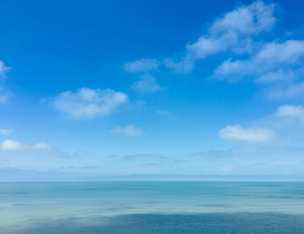 tranquil blue sky and ocean horizon view