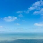 tranquil blue sky and ocean horizon view