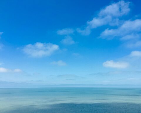tranquil blue sky and ocean horizon view