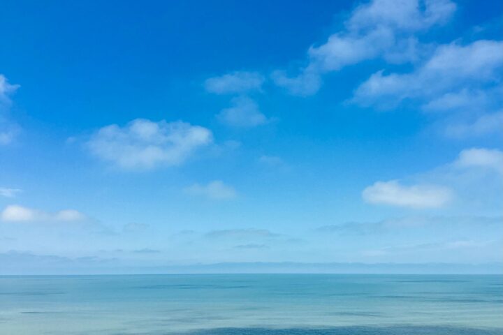 tranquil blue sky and ocean horizon view